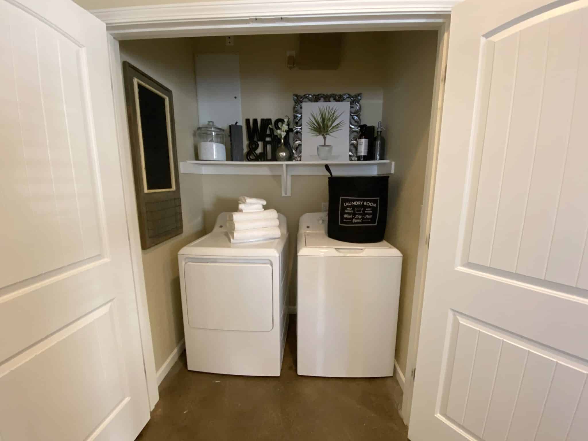 the collective at auburn off campus apartments near aurburn university laundry room in unit full size washer and dryer min